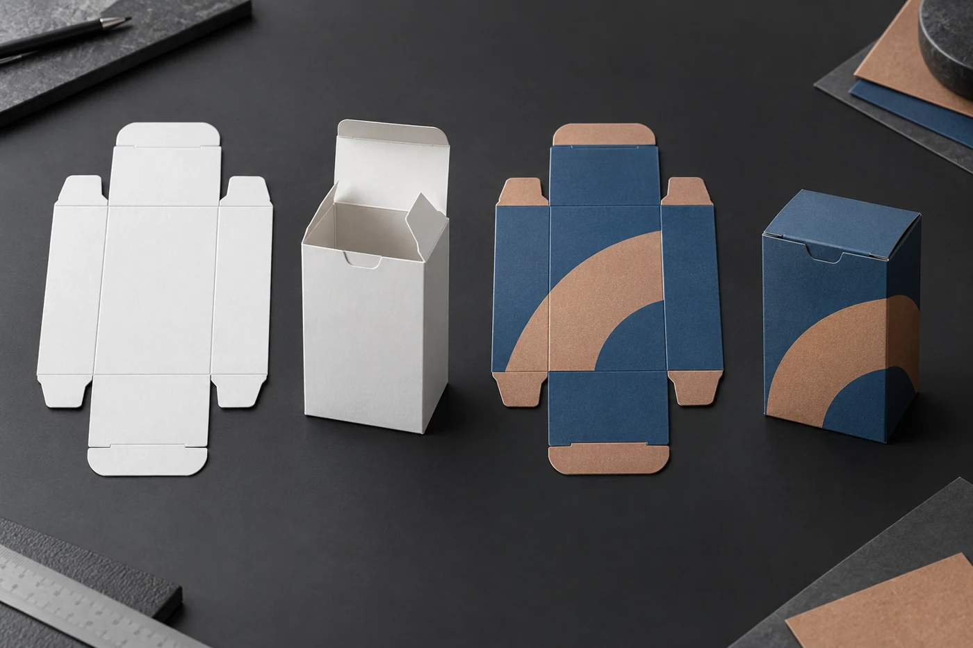 Flat blank, white dummy, printed proof and finished carton arranged for production review